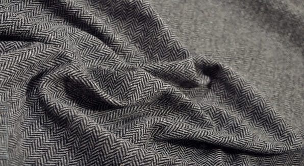 Visgraat tweed stof